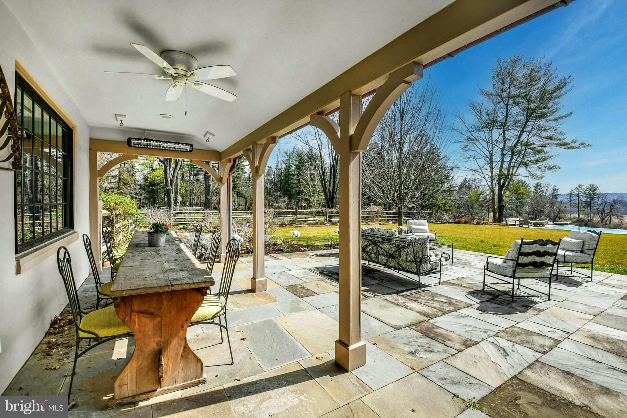 7043 Phillips Mill Road New Hope, PA 18938 - Photo 52 of 84 a view of swimming pool with a patio