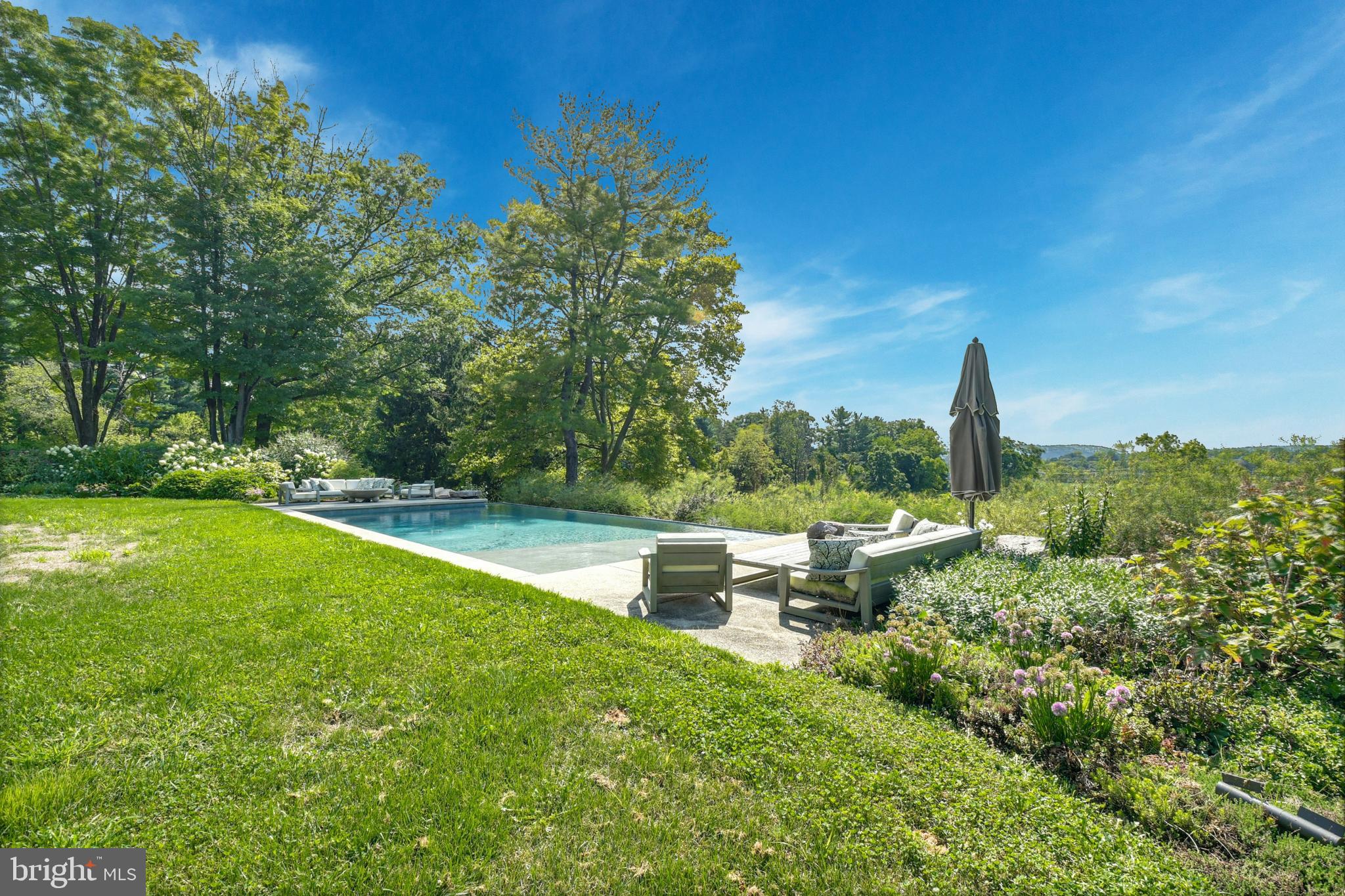 7043 Phillips Mill Road New Hope, PA 18938 - Photo 74 of 84 a view of a garden with lawn chairs