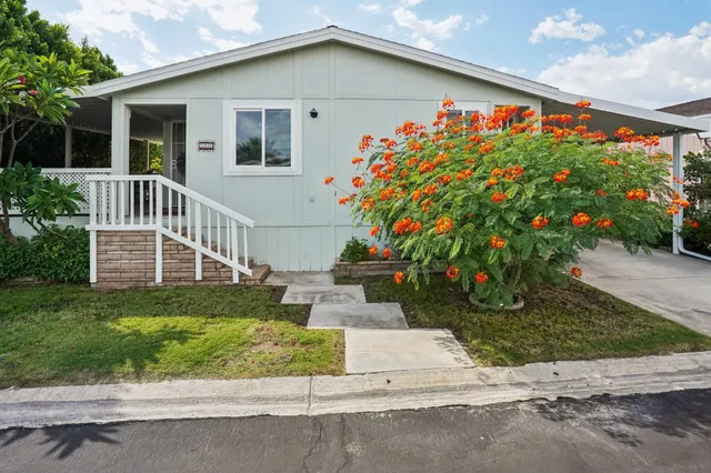a front view of a house with a garage