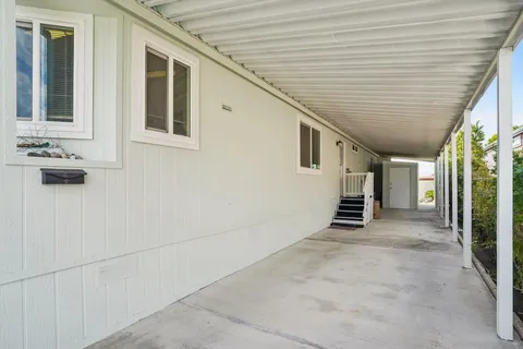a view of a house with a staircase
