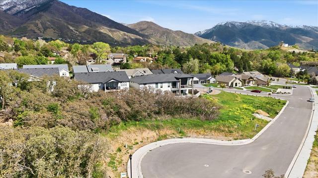 5102 Sunset Way, Unit 404 Ogden, UT 84403 - Photo 10 of 13 Mountain view with nearby suburban area