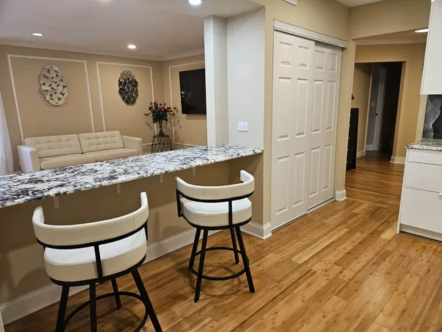 a living room with a couch and a table