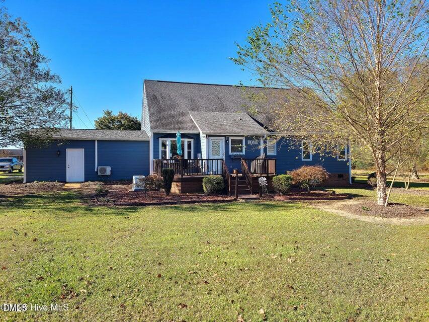 1000 High House Road Clinton, NC 28328 - Photo 29 of 36 a view of a house with swimming pool and a yard