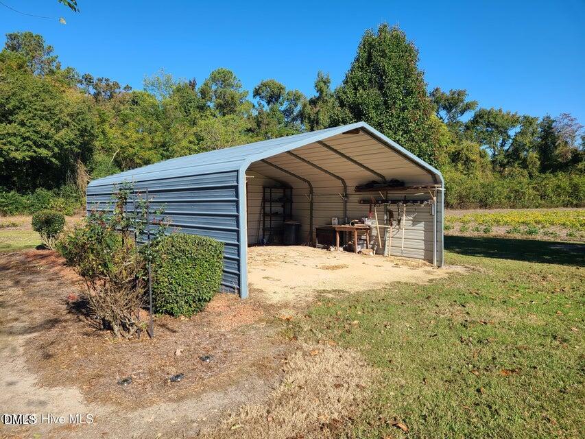 1000 High House Road Clinton, NC 28328 - Photo 36 of 36 a front view of a house with a yard