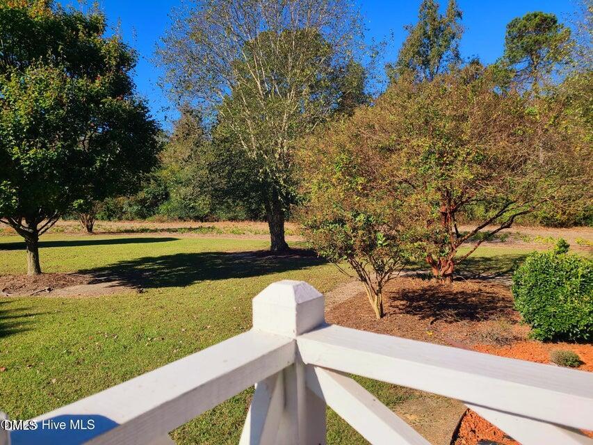 1000 High House Road Clinton, NC 28328 - Photo 8 of 36 a view of a lake with a yard