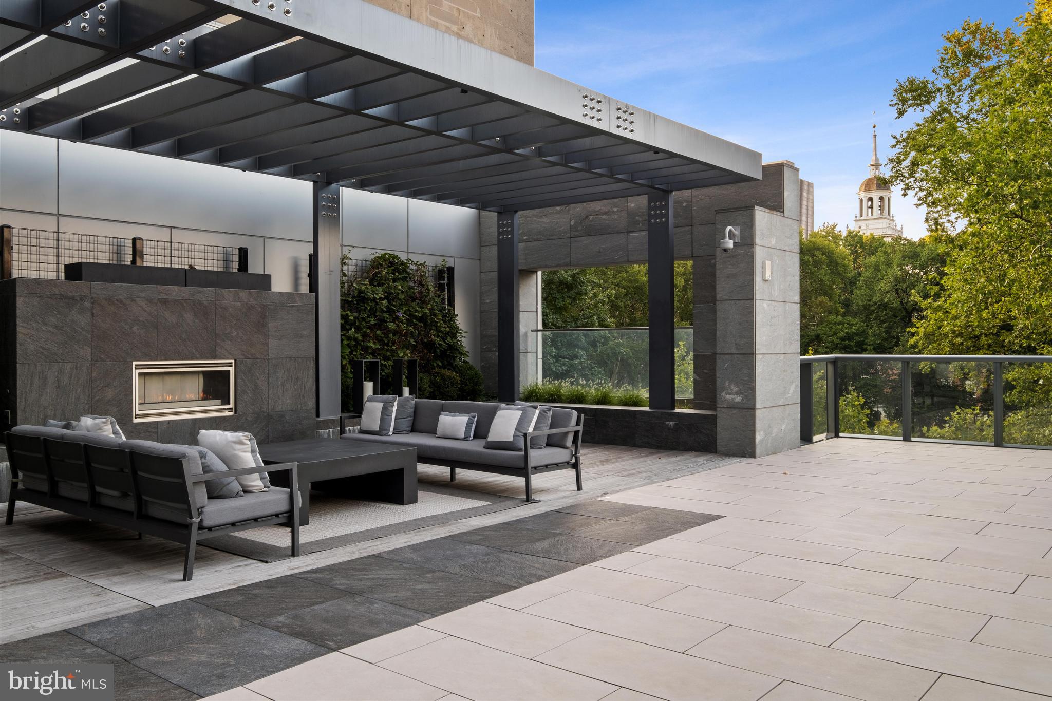 500 Walnut Street, Unit 1001 Philadelphia, PA 19106 - Photo 54 of 60 a view of a patio with a table and chairs