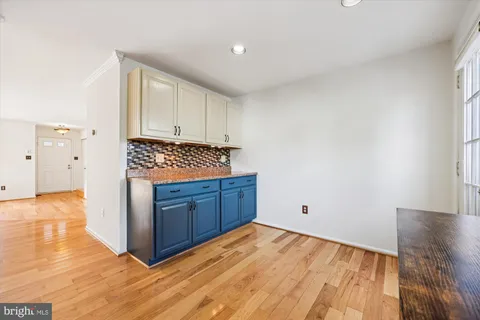 a view of kitchen with wooden floor