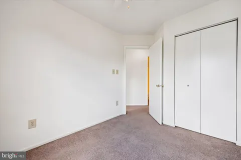 an empty room with closet