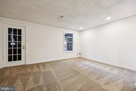 a view of a building with a yard