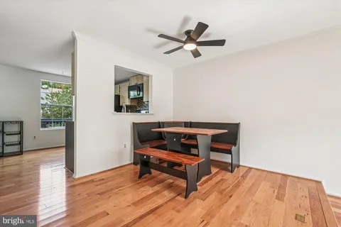 a living room with a bed and furniture