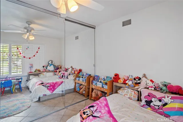 a children room with toys and a couch