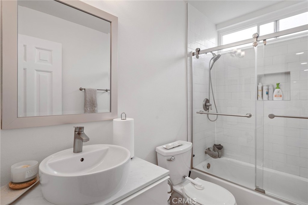 25902 Vía Del Sur Mission Viejo, CA 92691 - Photo 15 of 30 a bathroom with a sink toilet and shower