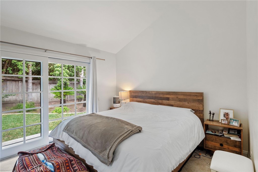 25902 Vía Del Sur Mission Viejo, CA 92691 - Photo 16 of 30 a bedroom with a bed and a large window