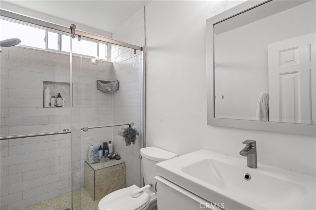 25902 Vía Del Sur Mission Viejo, CA 92691 - Photo 19 of 30 a bathroom with a sink a toilet and shower