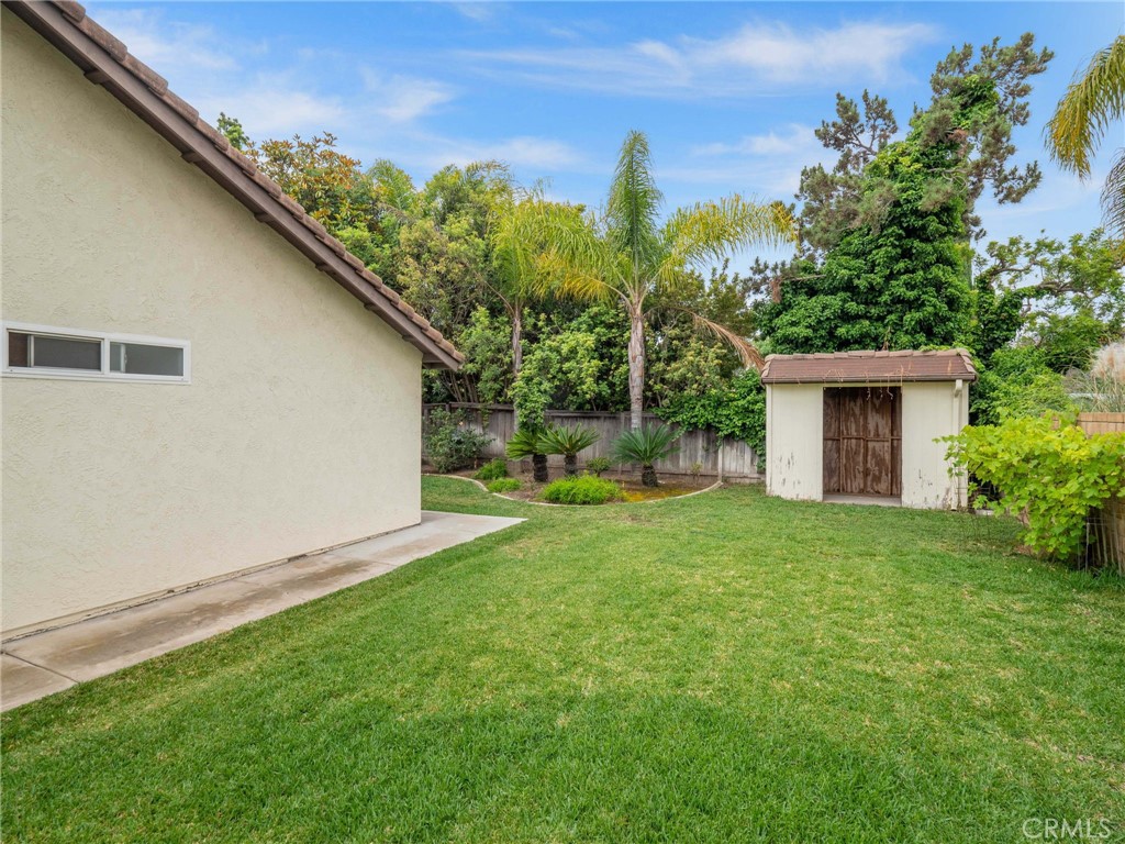 25902 Vía Del Sur Mission Viejo, CA 92691 - Photo 21 of 30 a view of a backyard with plants and a large tree