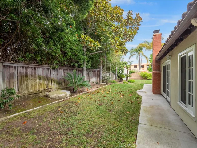 a view of a backyard with a garden