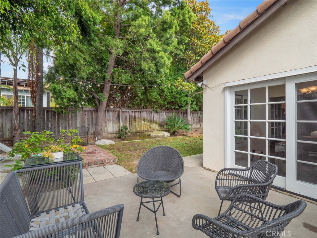 25902 Vía Del Sur Mission Viejo, CA 92691 - Photo 24 of 30 a backyard of a house with table and chairs