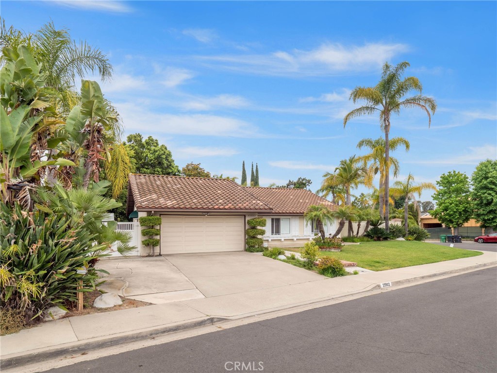 25902 Vía Del Sur Mission Viejo, CA 92691 - Photo 28 of 30 a front view of a house with a yard and garage