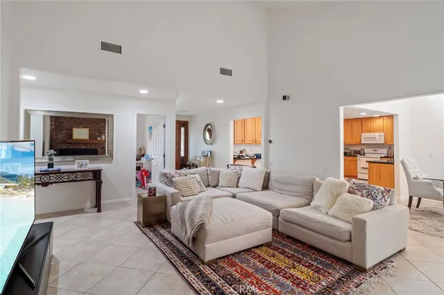 a view of a house with a yard and plants