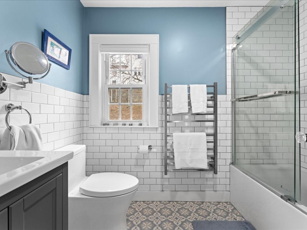40 Lake Shore Road Boston, MA 02135 - Photo 20 of 39 a bathroom with a toilet a sink and bathtub