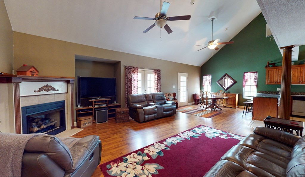 1365 No Pone Valley Road Northwest Georgetown, TN 37336 - Photo 3 of 48 a living room with furniture a fireplace and a flat screen tv