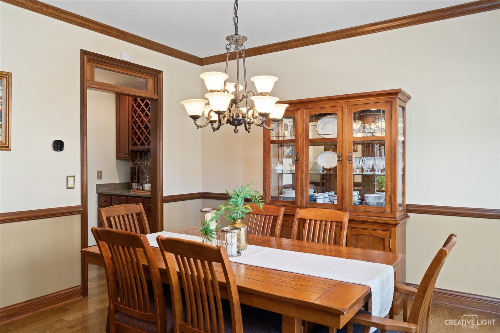 3519 Vanilla Grass Drive Naperville, IL 60564 - Photo 11 of 48 a view of a dining room with furniture window and wooden floor