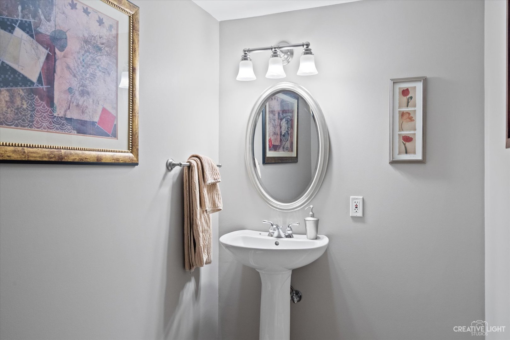 3519 Vanilla Grass Drive Naperville, IL 60564 - Photo 16 of 48 a bathroom with a sink and a mirror
