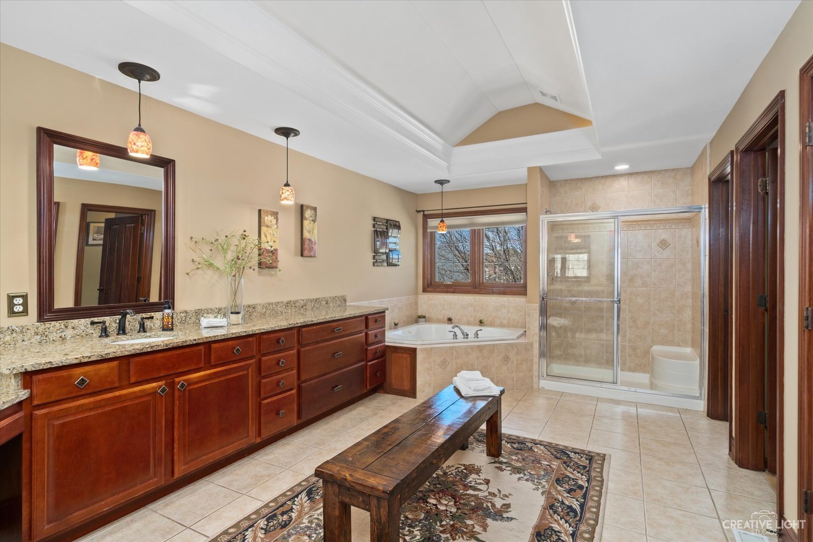 3519 Vanilla Grass Drive Naperville, IL 60564 - Photo 19 of 48 a spacious bathroom with a granite countertop tub sink and mirror