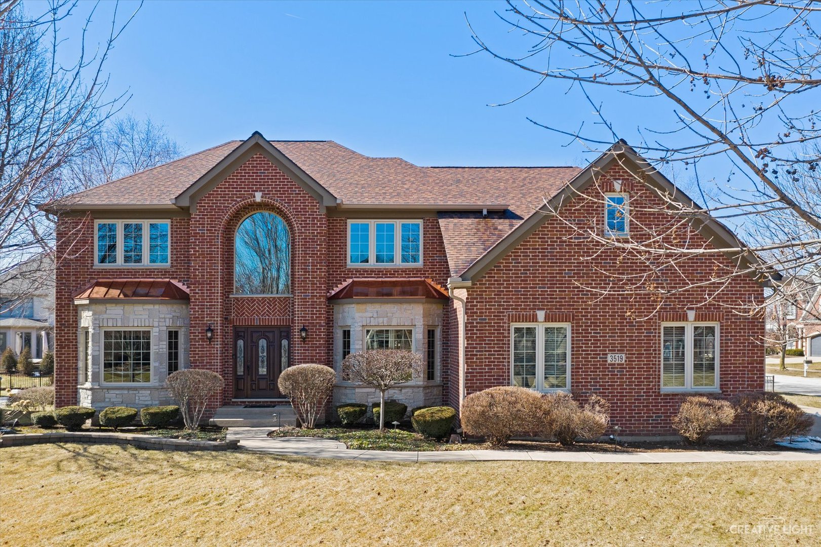 3519 Vanilla Grass Drive Naperville, IL 60564 - Photo 40 of 48 a front view of a house with yard outdoor seating and barbeque oven