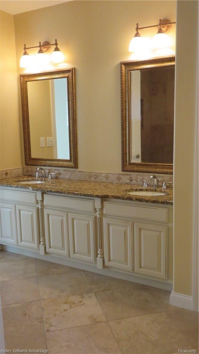 6487 North Beck Road Canton, MI 48187 - Photo 25 of 41 Luxury master bath with stone,granite and upscale cabinetry