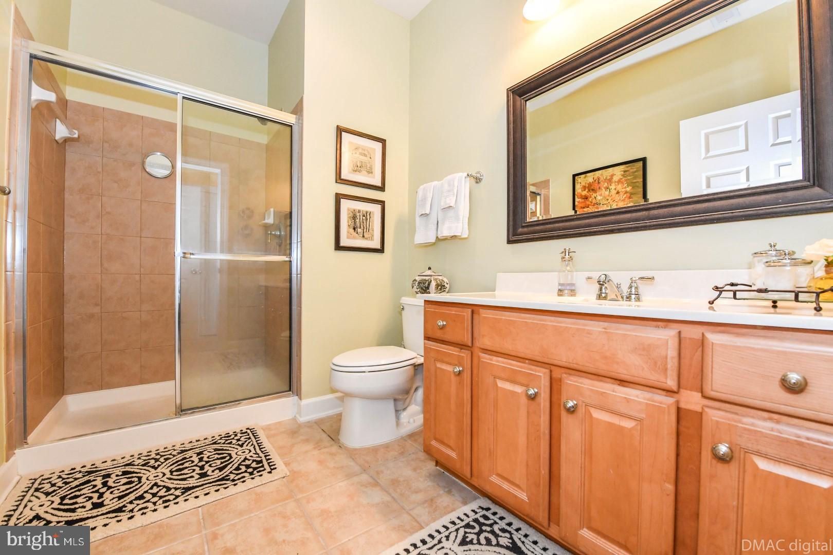 35 East All Saints Street, Unit 104 Frederick, MD 21701 - Photo 12 of 46 Charming en-suite guest full bath.
