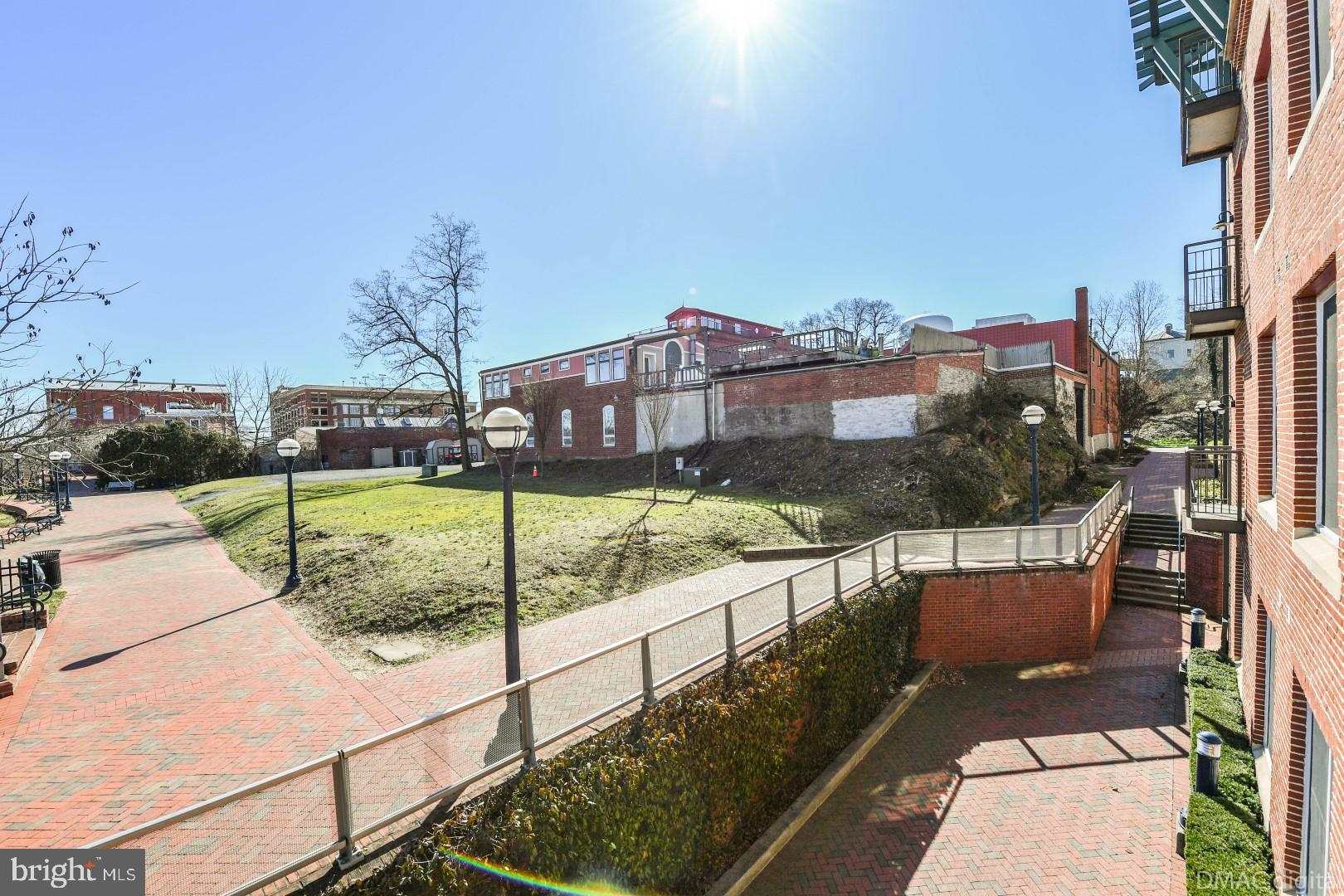 35 East All Saints Street, Unit 104 Frederick, MD 21701 - Photo 29 of 46 Side walkway from the Maxwell Place building.