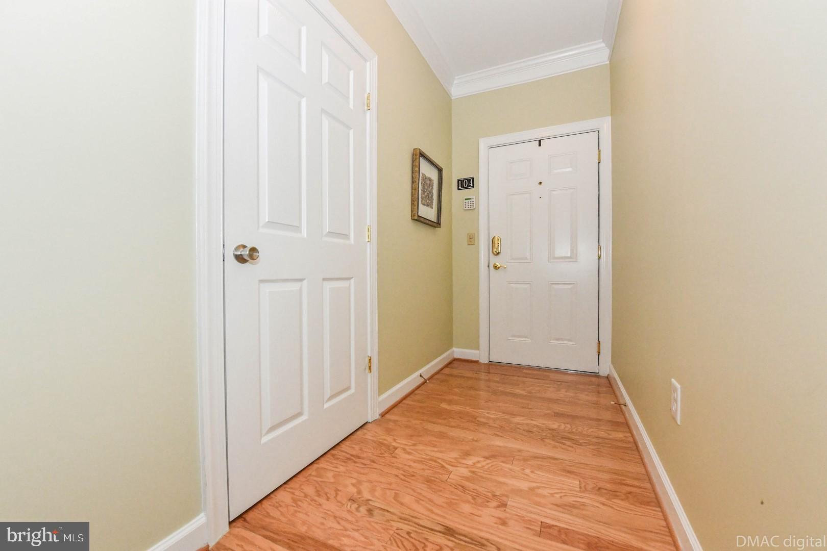35 East All Saints Street, Unit 104 Frederick, MD 21701 - Photo 4 of 46 Coat closet located just inside the front door.