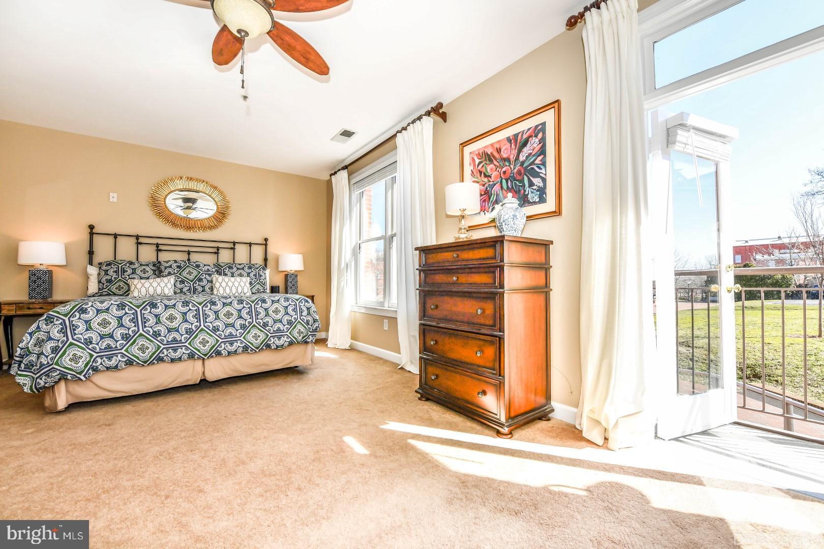 35 East All Saints Street, Unit 104 Frederick, MD 21701 - Photo 8 of 46 Balcony doors open for outstanding light.