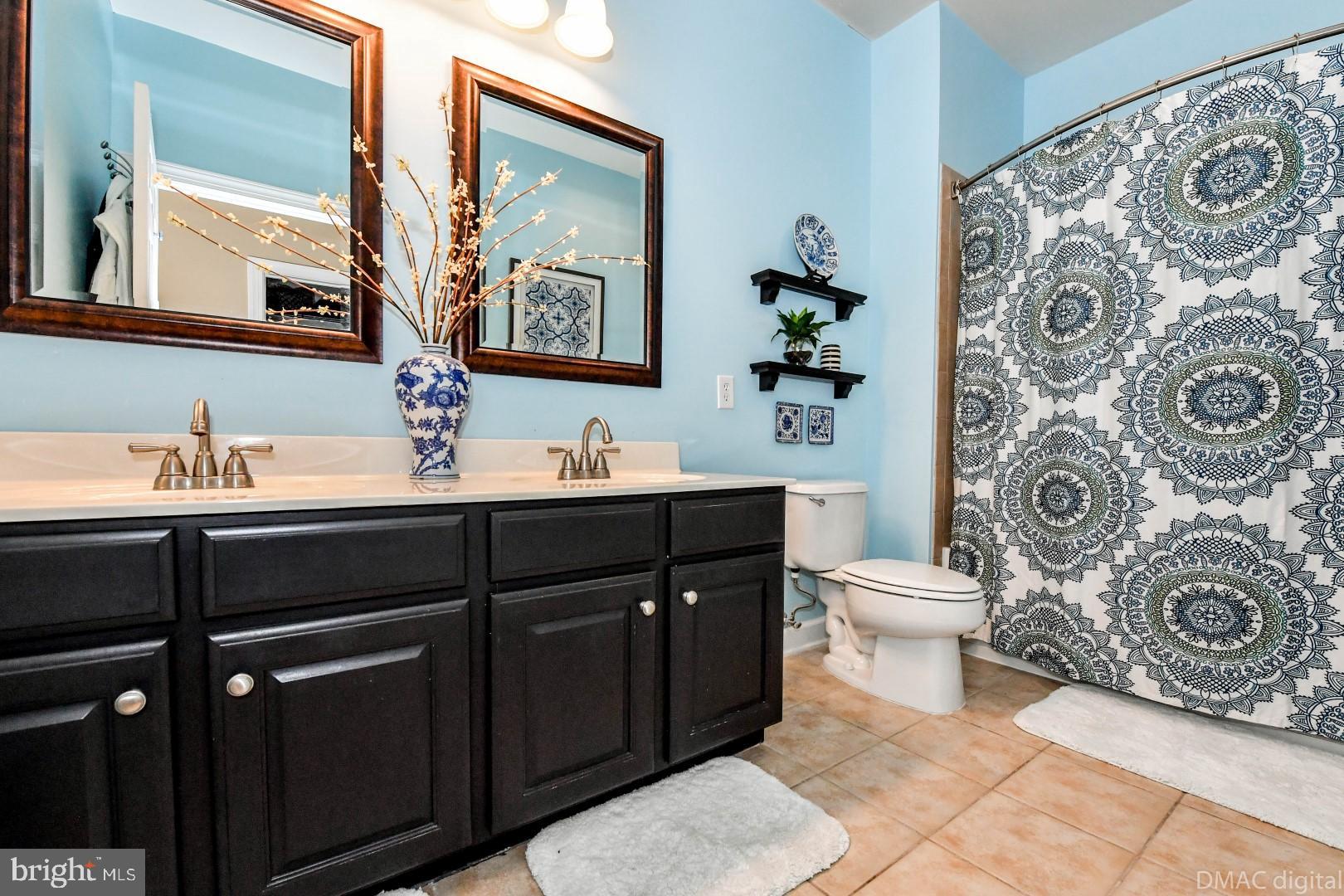35 East All Saints Street, Unit 104 Frederick, MD 21701 - Photo 9 of 46 Chic master bath with dual vanity.
