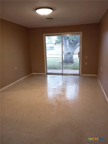 an empty room with a window