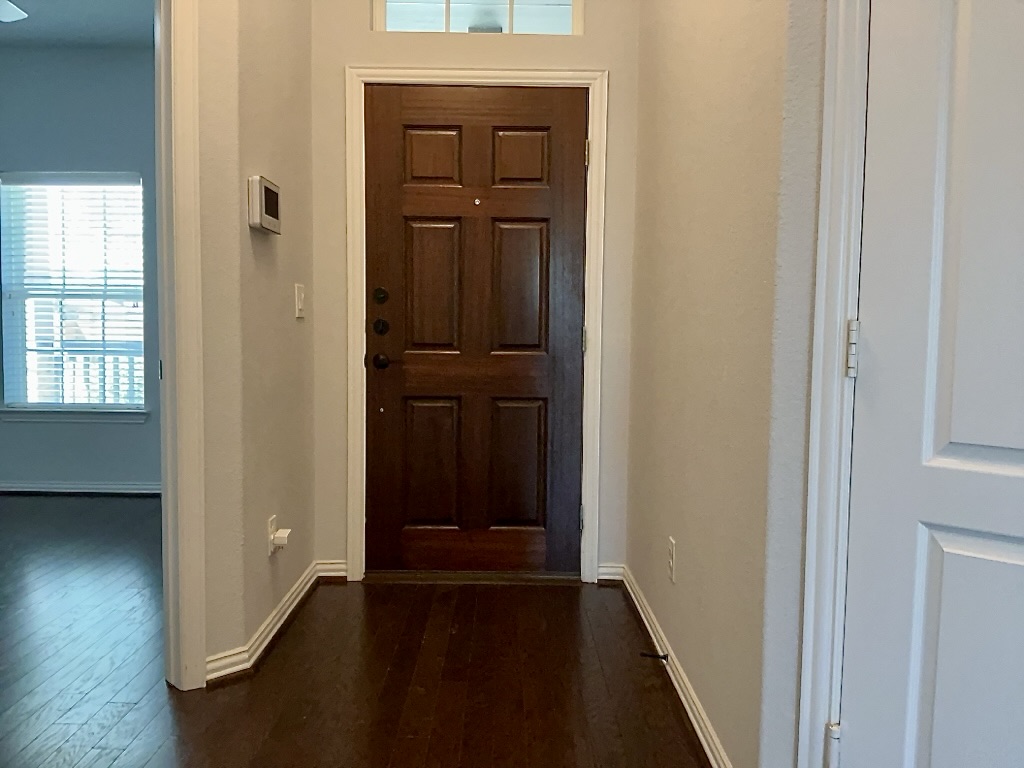209 Penna Lane Georgetown, TX 78628 - Photo 3 of 19 an entryway to room with wooden floor