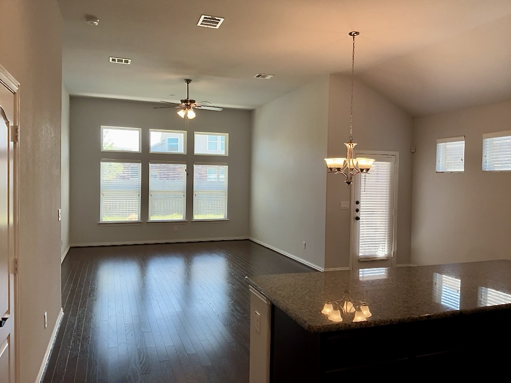 209 Penna Lane Georgetown, TX 78628 - Photo 19 of 19 a view of a livingroom with a ceiling fan and window