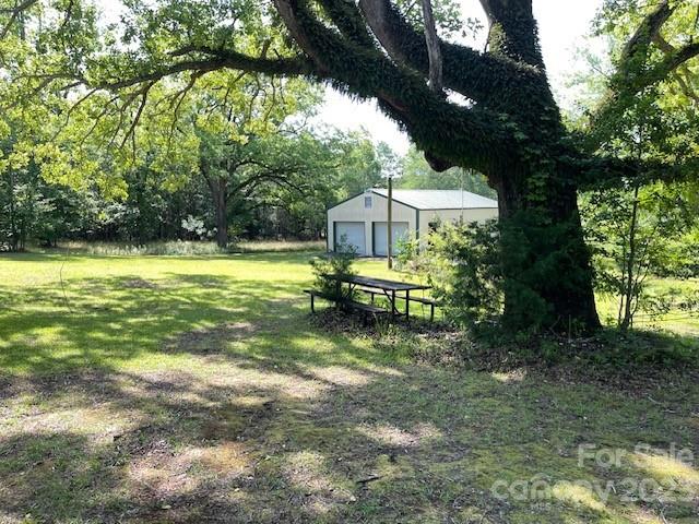 149 Robert Joyner Circle Salley, SC 29137 - Photo 16 of 48 a view of a house with a yard balcony and sitting area