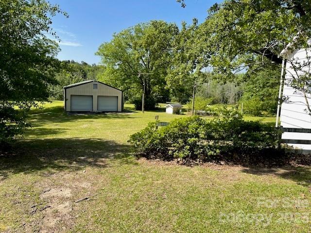 149 Robert Joyner Circle Salley, SC 29137 - Photo 19 of 48 a view of a house with a yard