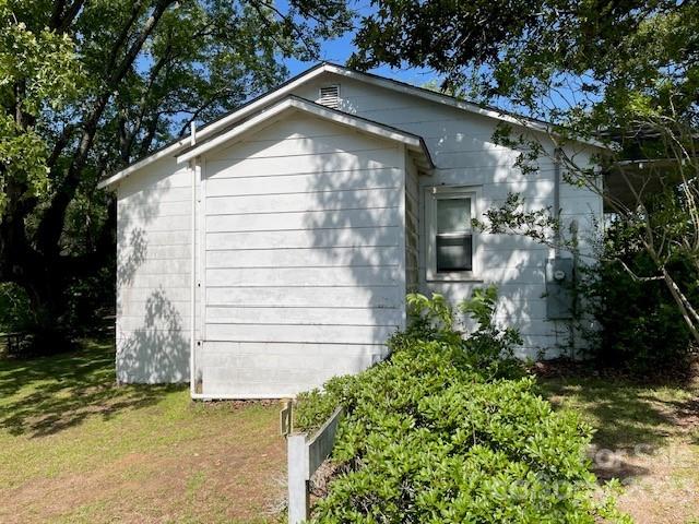 149 Robert Joyner Circle Salley, SC 29137 - Photo 21 of 48 a front view of a house with a yard