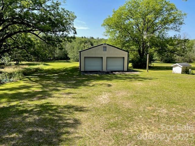 149 Robert Joyner Circle Salley, SC 29137 - Photo 22 of 48 a view of a house with a yard