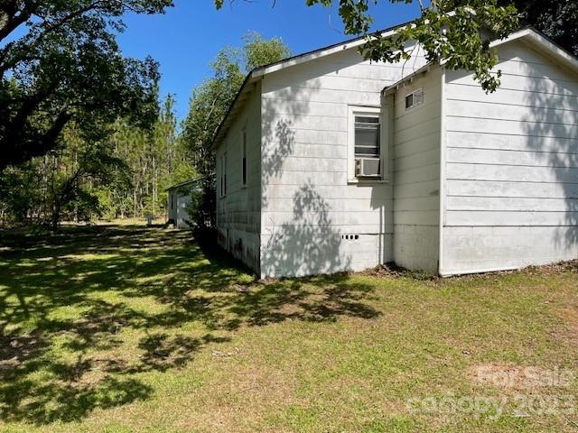 149 Robert Joyner Circle Salley, SC 29137 - Photo 26 of 48 a view of a back yard of the house
