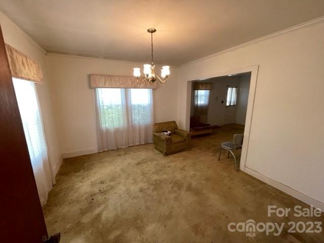 149 Robert Joyner Circle Salley, SC 29137 - Photo 31 of 48 an empty room with windows and hardwood floor