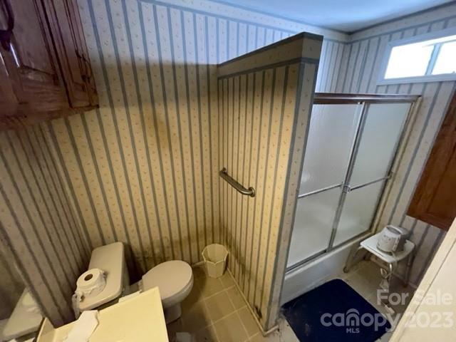 149 Robert Joyner Circle Salley, SC 29137 - Photo 37 of 48 a bathroom with a toilet and shower