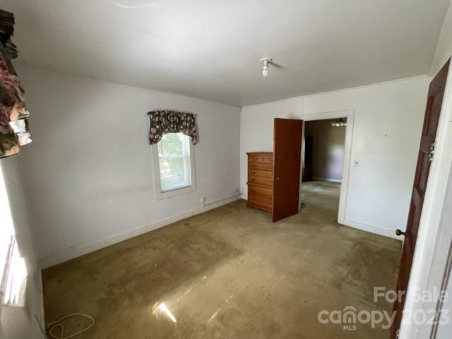149 Robert Joyner Circle Salley, SC 29137 - Photo 39 of 48 en empty room with windows and closet