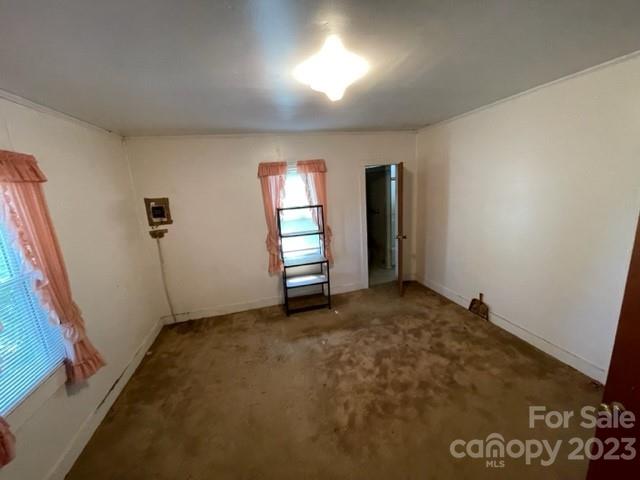 149 Robert Joyner Circle Salley, SC 29137 - Photo 40 of 48 an empty room with windows