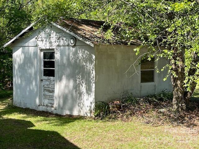 149 Robert Joyner Circle Salley, SC 29137 - Photo 4 of 48 a front view of a house with a yard