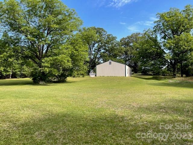 149 Robert Joyner Circle Salley, SC 29137 - Photo 9 of 48 a view of a field with a trees