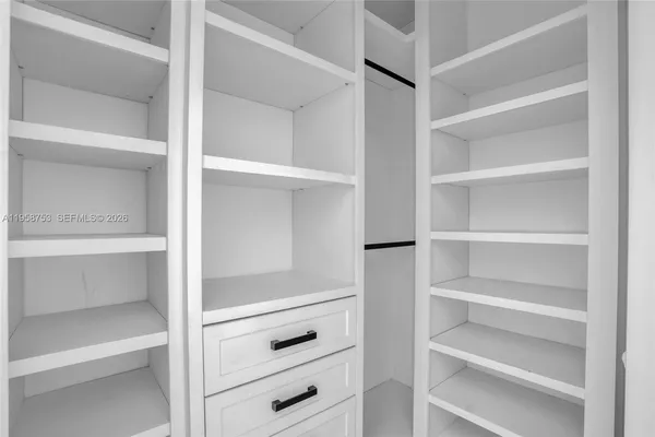 a view of a garage with storage